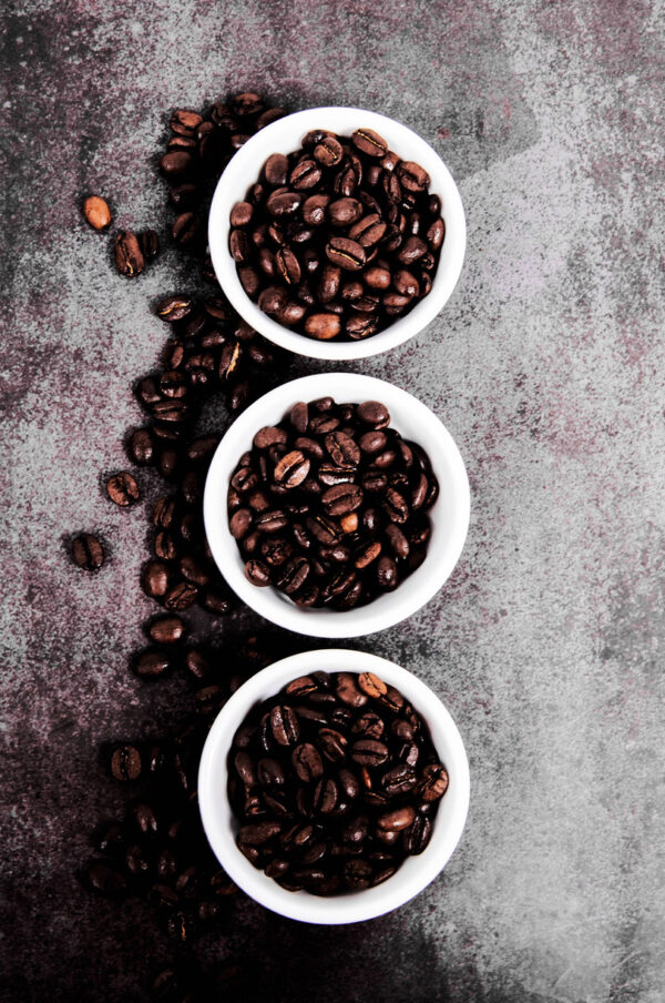 Stylized Wick coffee beans in ceramic bowls