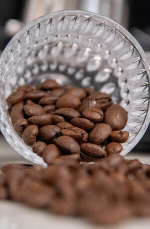 Stylized Wick coffee beans in crystal glass